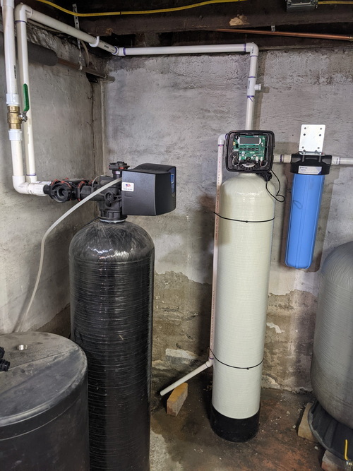 Beige and Black Water Softener